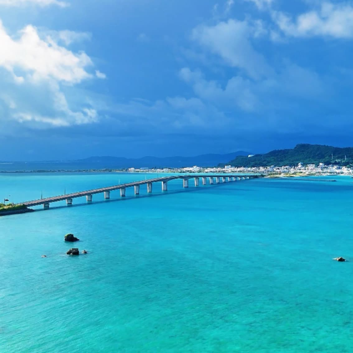 Hamahiga Bridge over calm east coast water, Uruma Okinawa