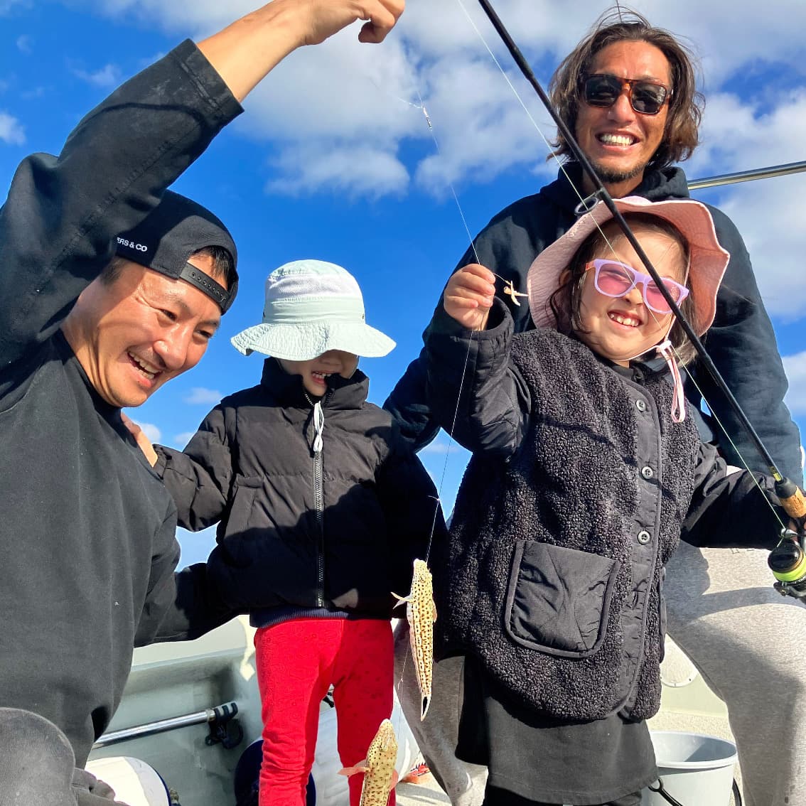 Family with their catch from private boat fishing